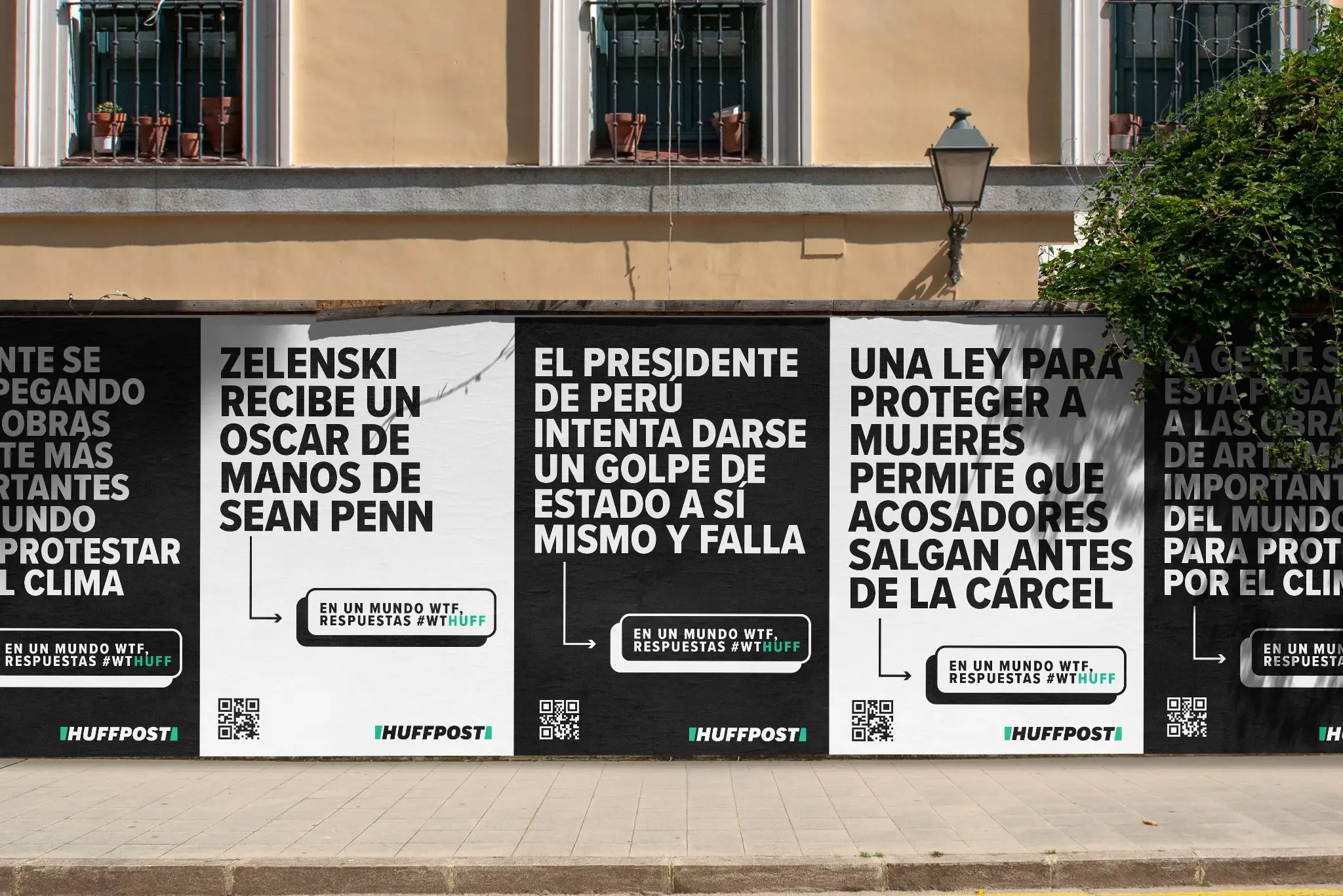 Maqueta de la agencia para la campaña: una valla de carteles de El HuffPost con titulares grandes y la llamada a usar #wthuff.